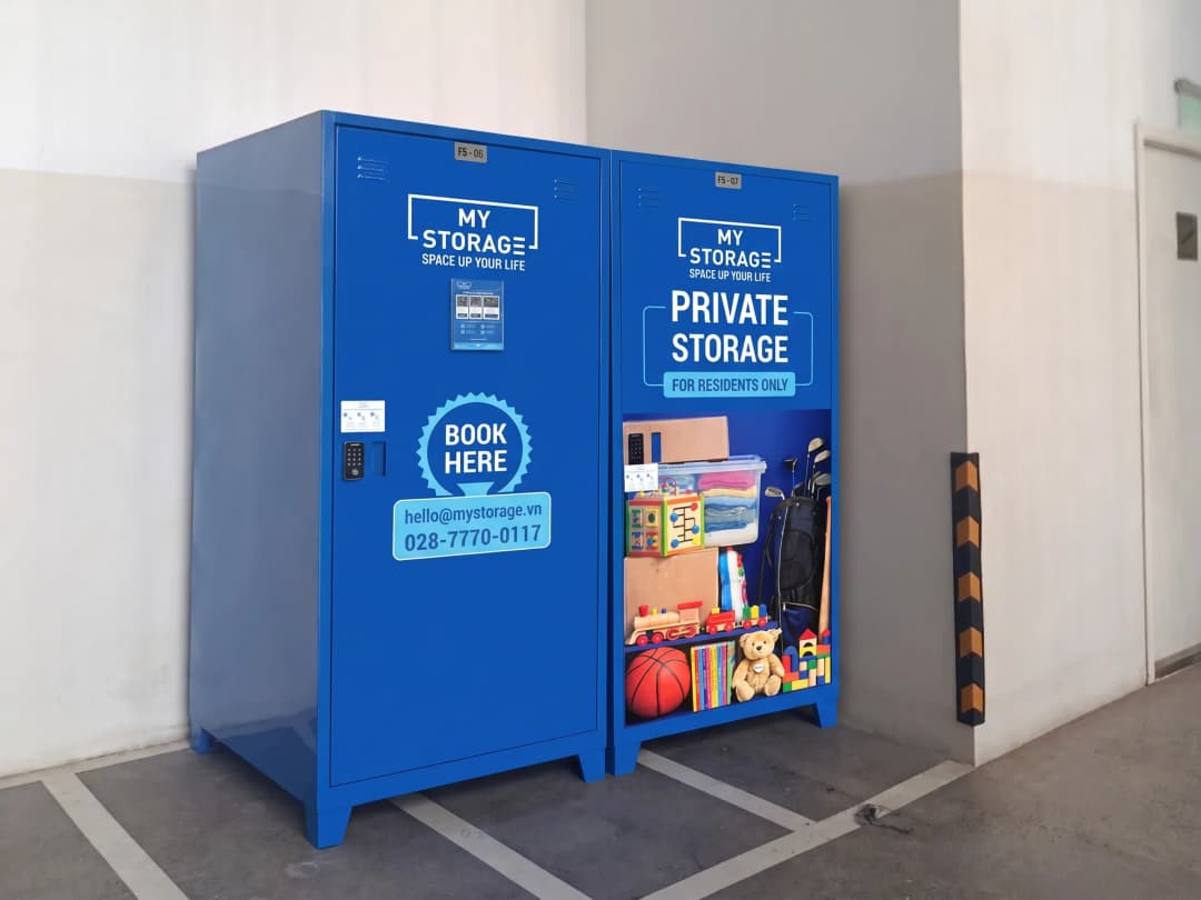 MyStorage private lockers for residents at Q2 Thao Dien, with a locker open showing stored toys and sports gear