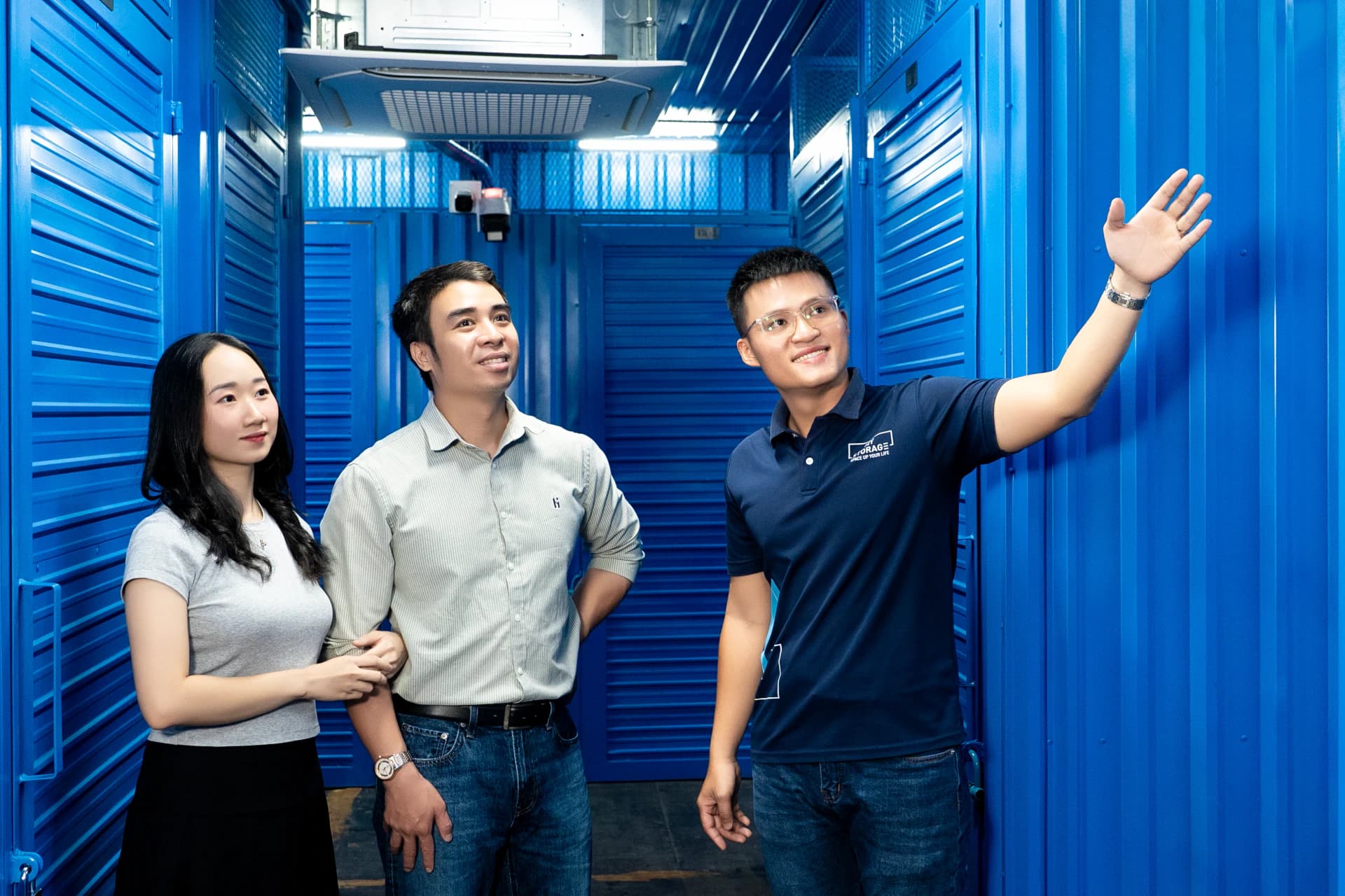 MyStorage employee advising clients inside a storage facility in Ho Chi Minh City
