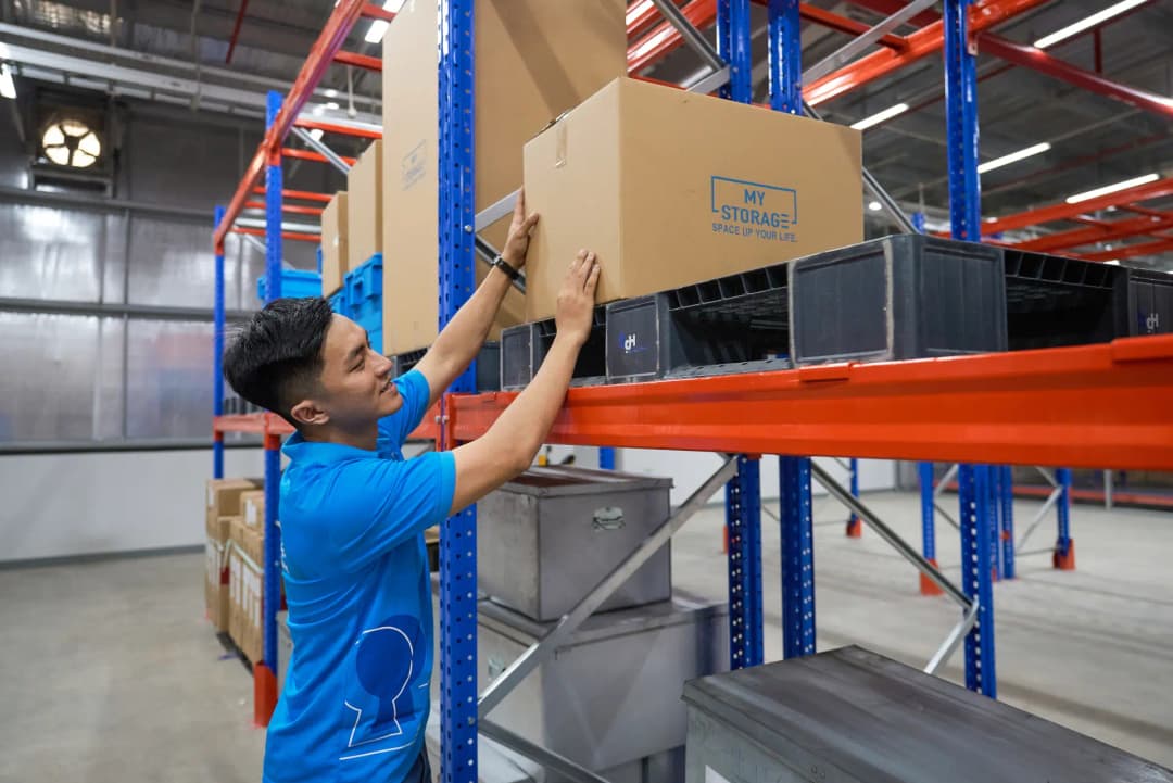 MyStorage team member in a blue shirt at the Dong Nai warehouse.